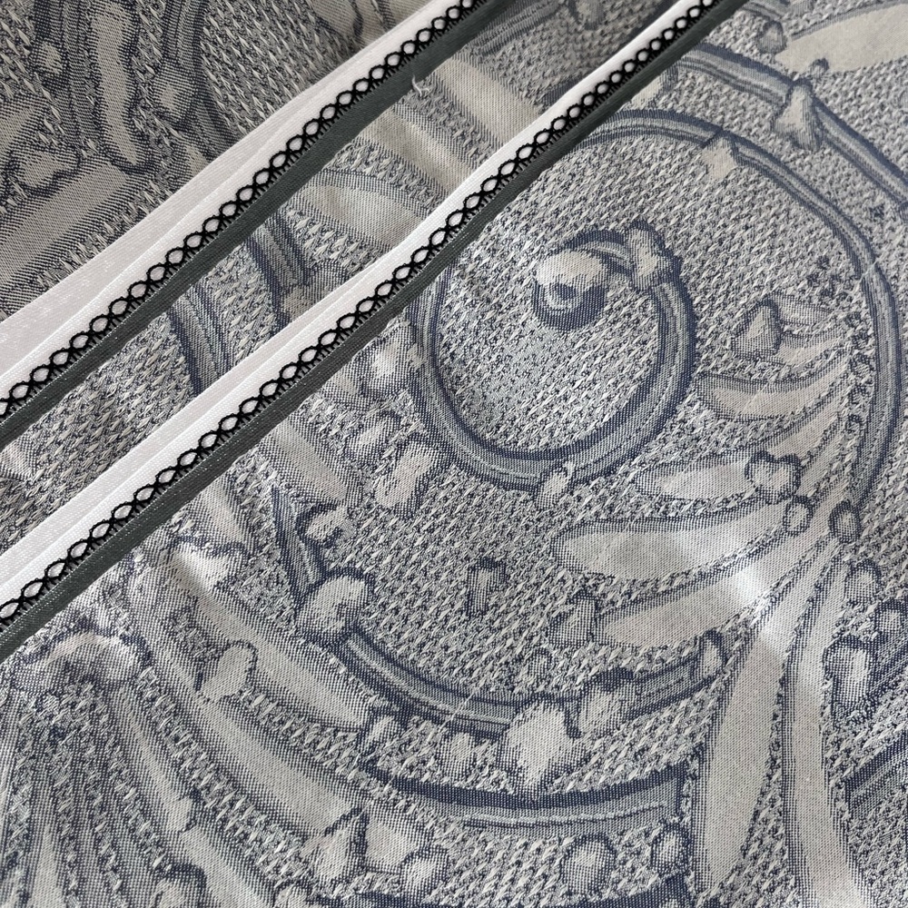 A pair of standard Yves Delorme pillow shams. - Picture 4 of 8